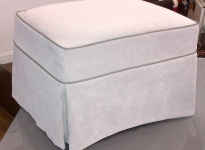 custom-ottoman-contrast-piping-and-kick-pleats